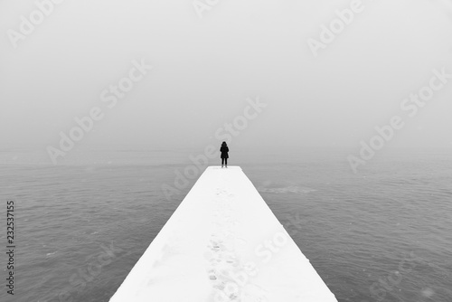 Woman on Winter Pier