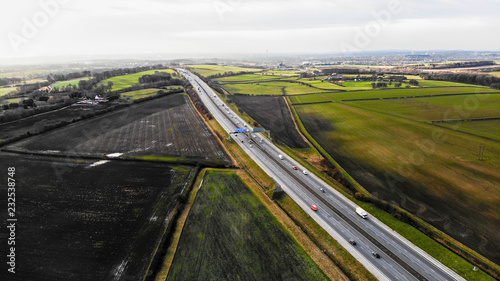 Aerial photo of a UK motorway taken in the Autumn.