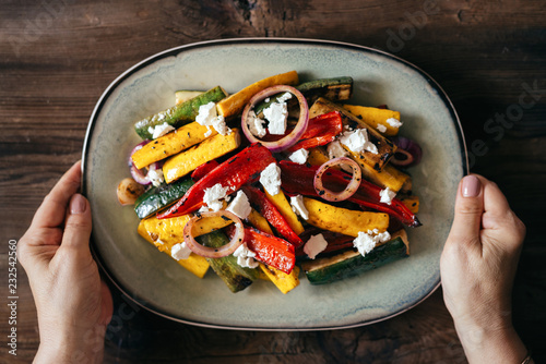 Roast vegetables with white cheese photo