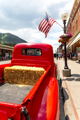 July 4, 2018 - Annual  Independence Day Parade, Telluride, Colorado Colorado Avenue - ffeatures vintage Ford Red Pickup Truck