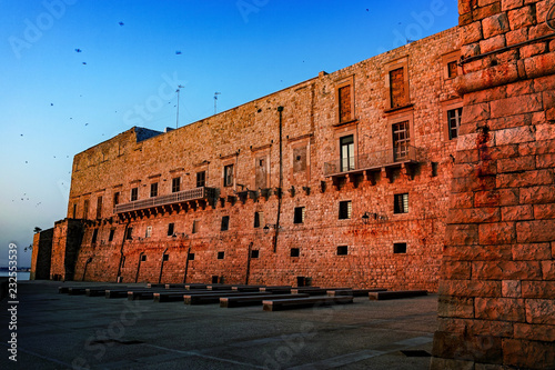 Normann castle in old small city Giovinazzo near Bari, Apulia, Italy in early morning photo