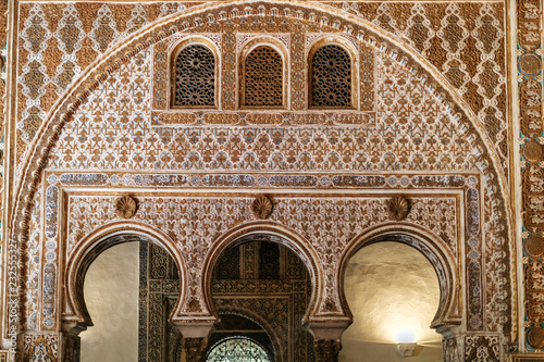 Moorish palace with carved stone wall photo