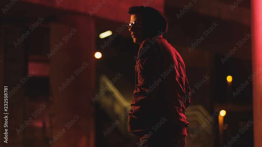 Portrait of a young man on the street