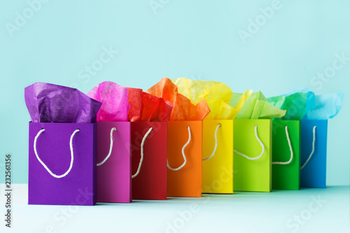 Row of colorful shopping bags photo