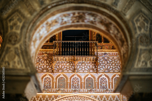 Moorish palace with carved stone wall photo