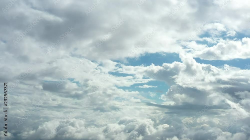 Video of beautiful and soft clouds moving on a blue sky Video of beautiful and soft clouds moving on a blue sky