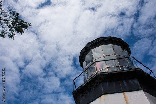 Cape Meares Lighthouse in Oregon on a sunny day - artistic angle photo