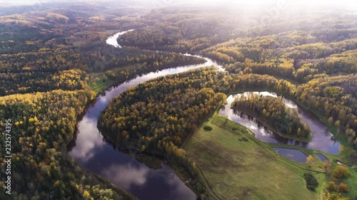 Aerial drone shot of forests and river valley in autumn in Gauja National Park, Latvia