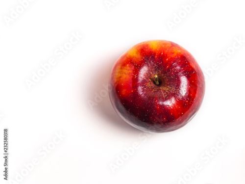 red apple on white background view from above