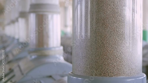 Manufacture of flour and cereals. Wheat milling. Production of wheat flour. Wheat flour milling equipment at the plant.