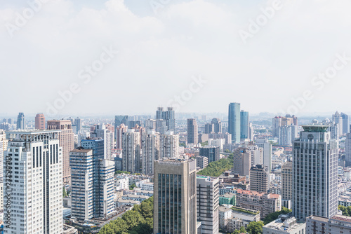 Modern city background, city daytime building © NAYUKIFILMS
