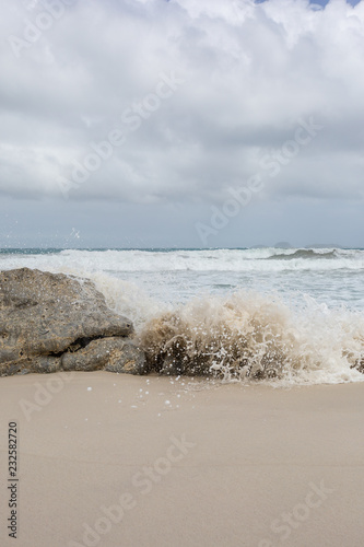 Fototapeta Naklejka Na Ścianę i Meble -  Wave crashing on the beach at Little Oberon Bay, Wilsons Promontory, Victoria, Australia.
