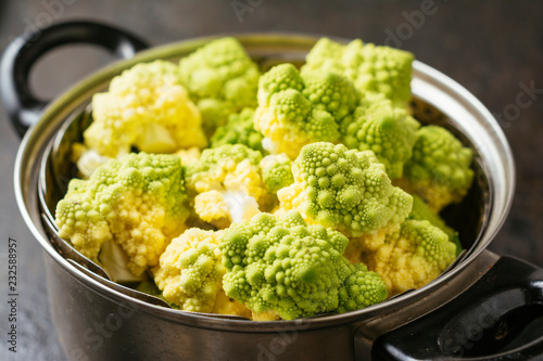Romanesco in a pot with steamer