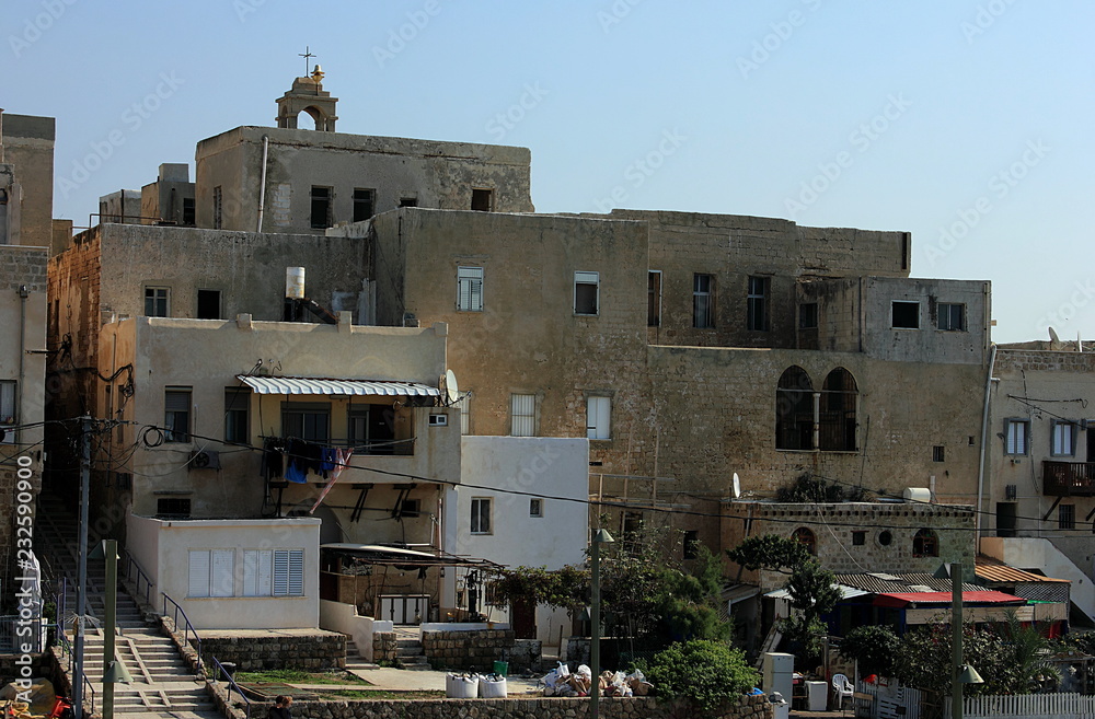 House, windows and balconies in the old city of Akko (Acre), Israel