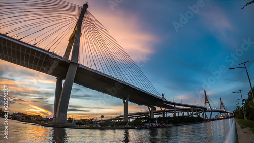 Sunset at Bhumibol Bridge over Chaopraya River in Bangkok Thailand © khamkula