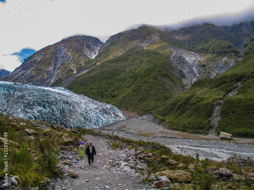 hiking in the mountains with glacier background