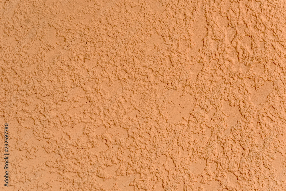 Light brown cement stone wall texture background