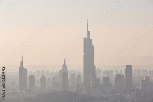 Nanjing, China. Severe air pollution, haze and poor visibility make the tall buildings in the city hard to see clearly