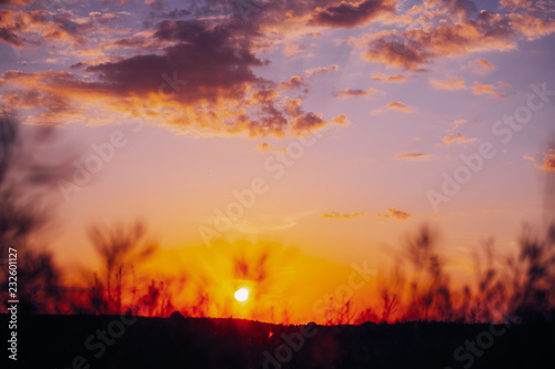 Sun At Sunset Sunrise Sky. Bright Dramatic Sky With Clouds. Yell © Grigory Bruev