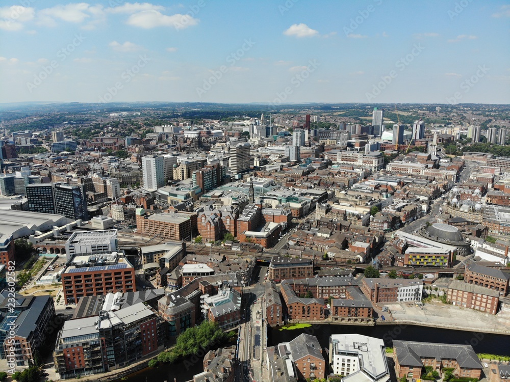 Fototapeta premium Aerial photo overlooking Leeds City Center in West Yorkshire showing buildings and businesses 