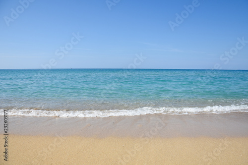 Tropical beach with turquoise clear water. Summer sandy beach with a blue sea water