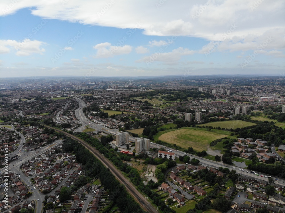 Aerial photo of the town of Seacroft near Crossgates in Leeds, showing houses, streets and roads.