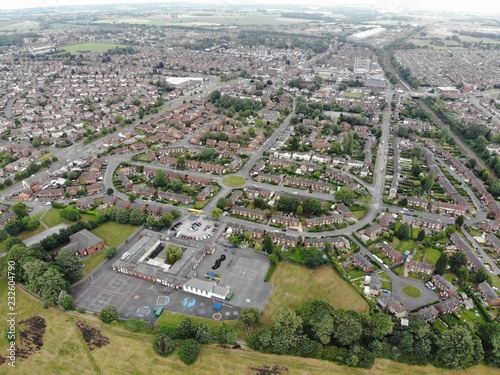 Aerial photo of the town of Seacroft near Crossgates in Leeds, showing houses, streets and roads.