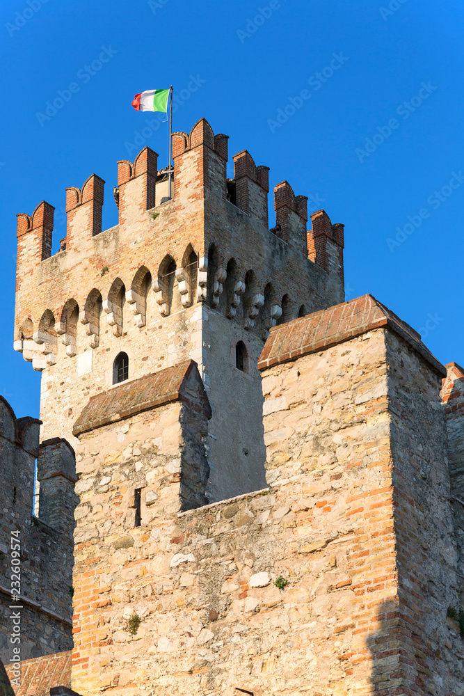 13th-century medieval stone Scaliger Castle (Castello Scaligero) on Lake Garda, Sirmione, Italy