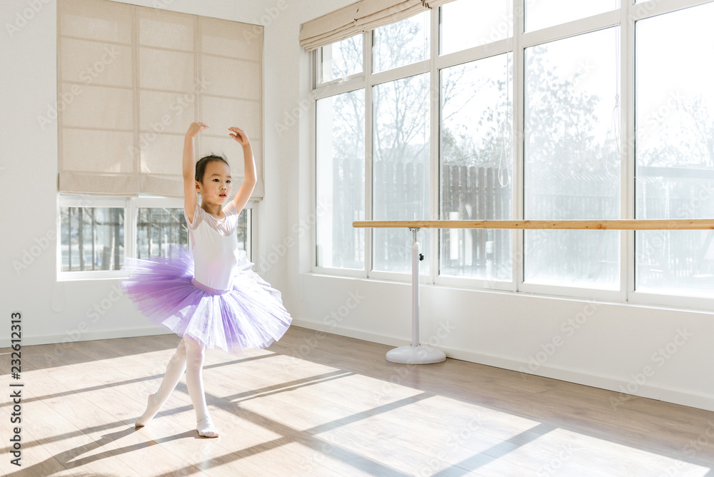 Girl dancing in ballet studio