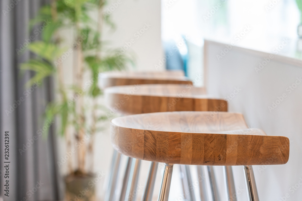 High wooden chairs in a kitchen High wooden chairs in a kitchen