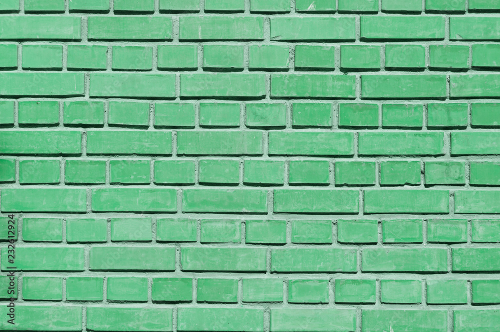 Fototapeta premium green brick wall close up