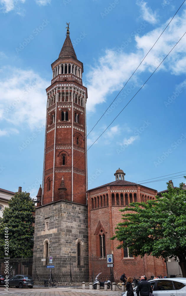Milan, Italy - 09 May 2018: San Gottardo Bell Tower in Milan, Italy. Architect Francesco Pecorari from Cremona. The first public mechanical clock in Milan is installed on the octagonal bell tower