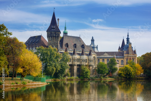 Beautiful cityscape of Vajdahunyad castle in Varosliget park, Budapest with reflection on the lake