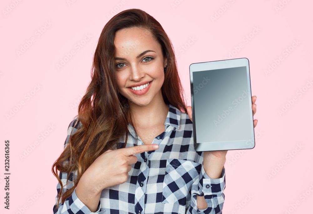 Modern woman presenting new tablet Modern woman presenting new tablet