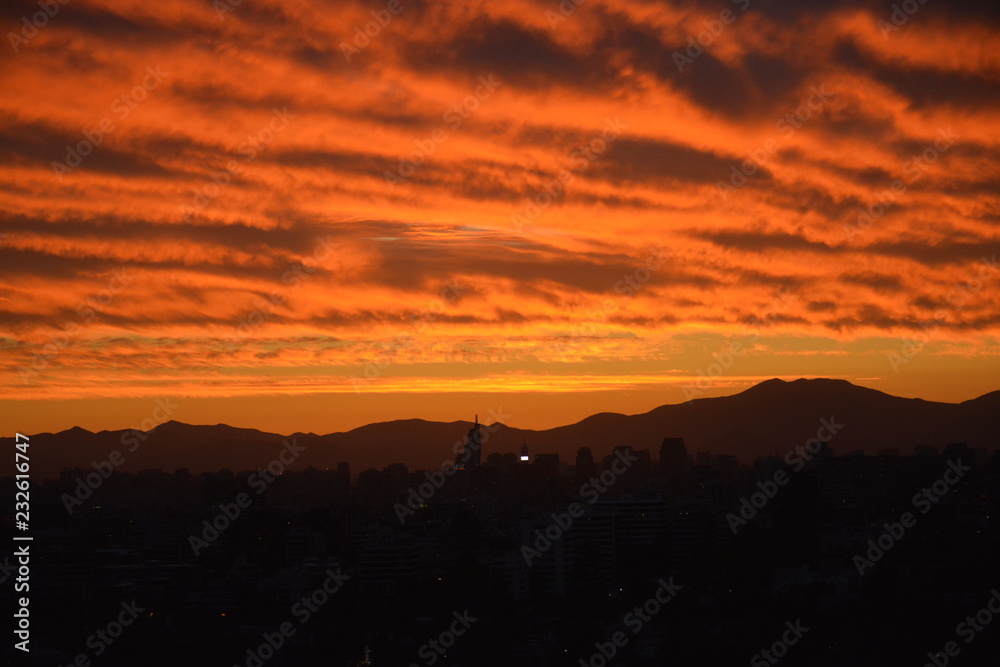 Obraz premium Sunset clouds and cityscape