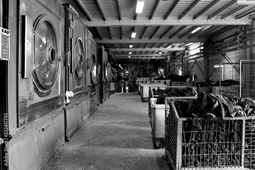 Black and white photograph of the old workshop washing and sandblasting jeans