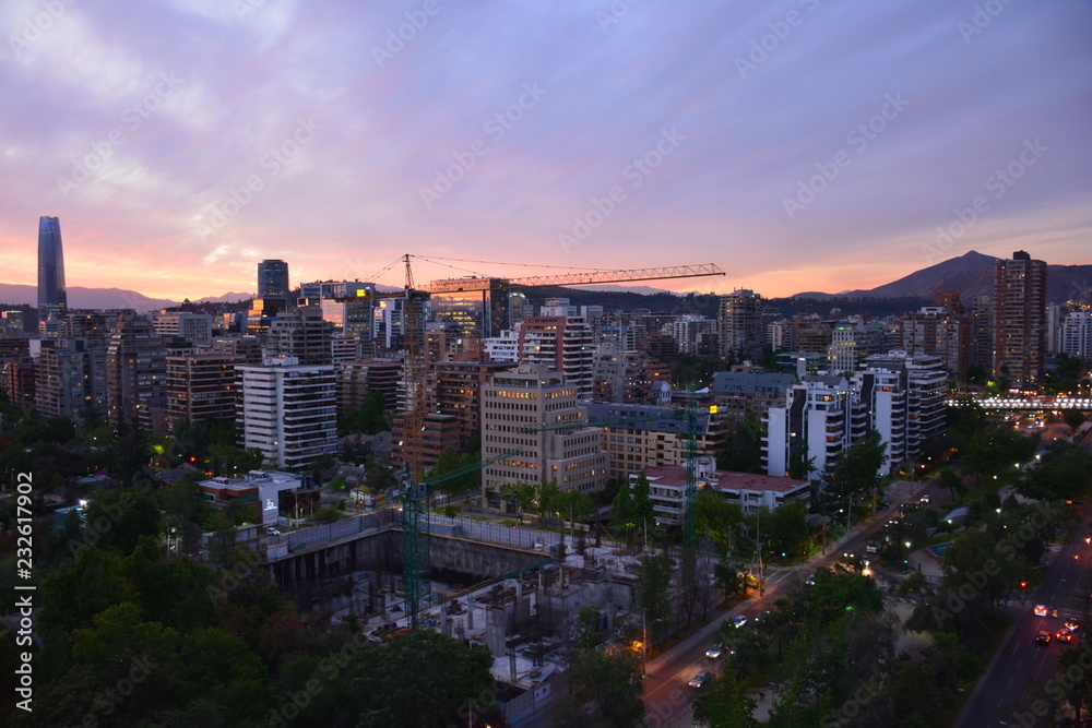 Obraz premium Sunset clouds and cityscape