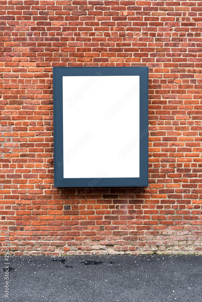 Blank advertising poster board on the brick wall on street.. Stock Photo |  Adobe Stock