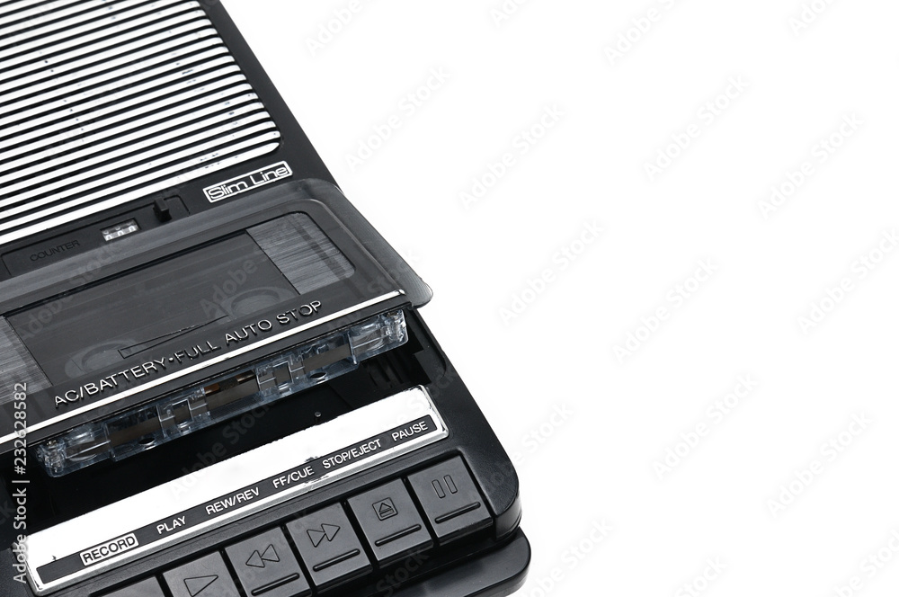 Obraz premium Old-time desktop type cassette recorder on white isolated background