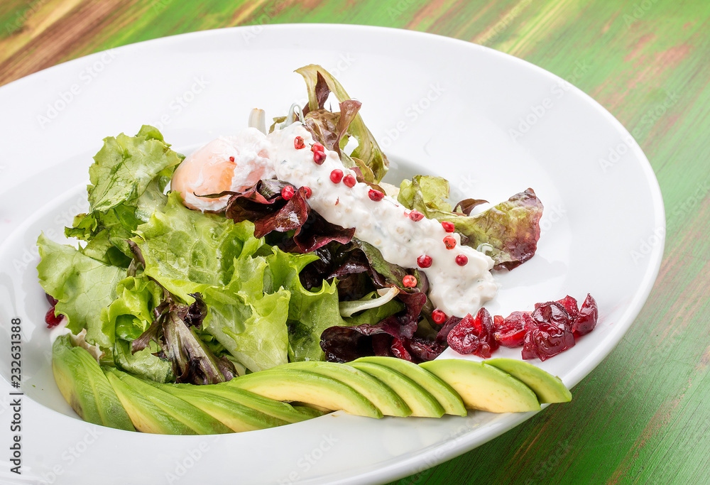 Salad with kino, avocado and poached egg Salad with kino, avocado and poached egg