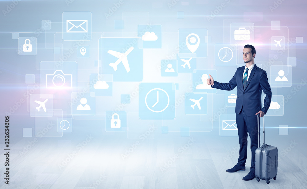 Businessman departs to a business trip with social media and travel symbol concept
Businessman departs to a business trip with social media and travel symbol concept