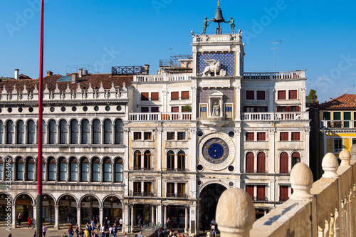 Unique Building With Blue Clock 