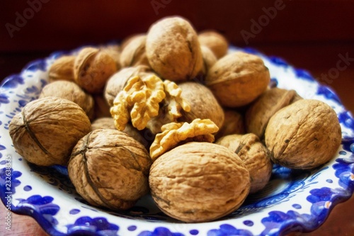 Walnuts in blue bowl. © slunicko24