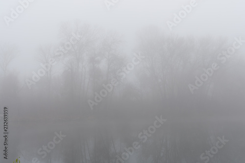  Foggy condition of the autumn November weather on the river