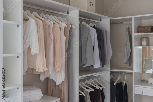 modern closet with clothes hanging © 290712