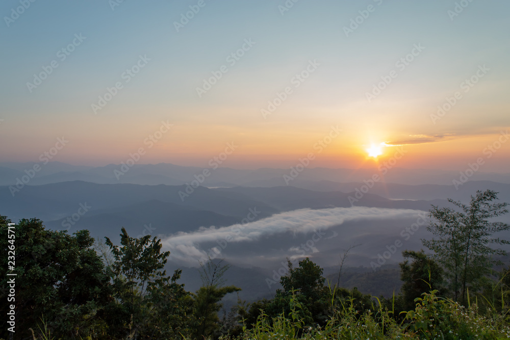 Fog and sun Morning after mountain at Phu Soi Dao National Park, Uttaradit in Thailand.