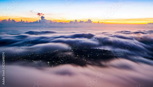 Photography over the city through the clouds, landscape long exposure
