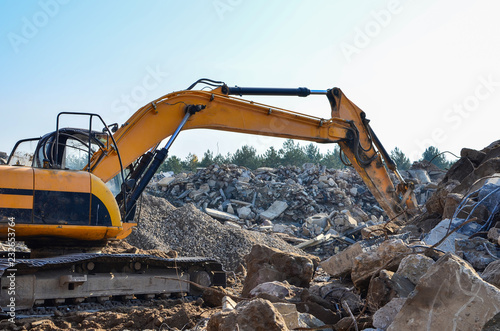 Machinery in a quarry extracting stone. Bulldozer
