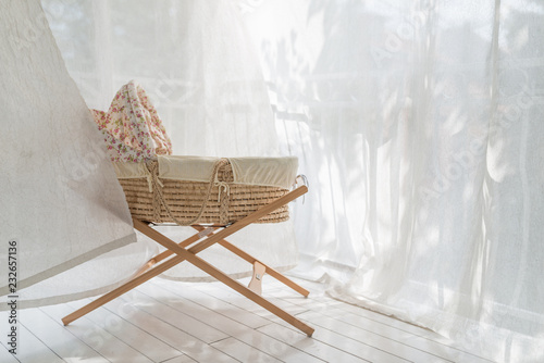 Photography Retro crib stand at balcony in white curtains