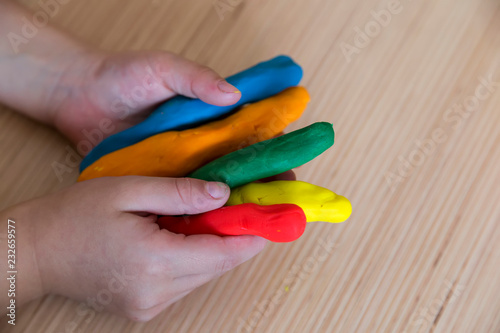 Playing with play dough for children   s activities in preschool or nursery.creative ideas for child development.back to school and happy teachers day concept.